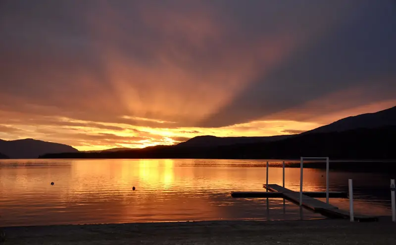 Sunset over a dock on Okanagan Lake